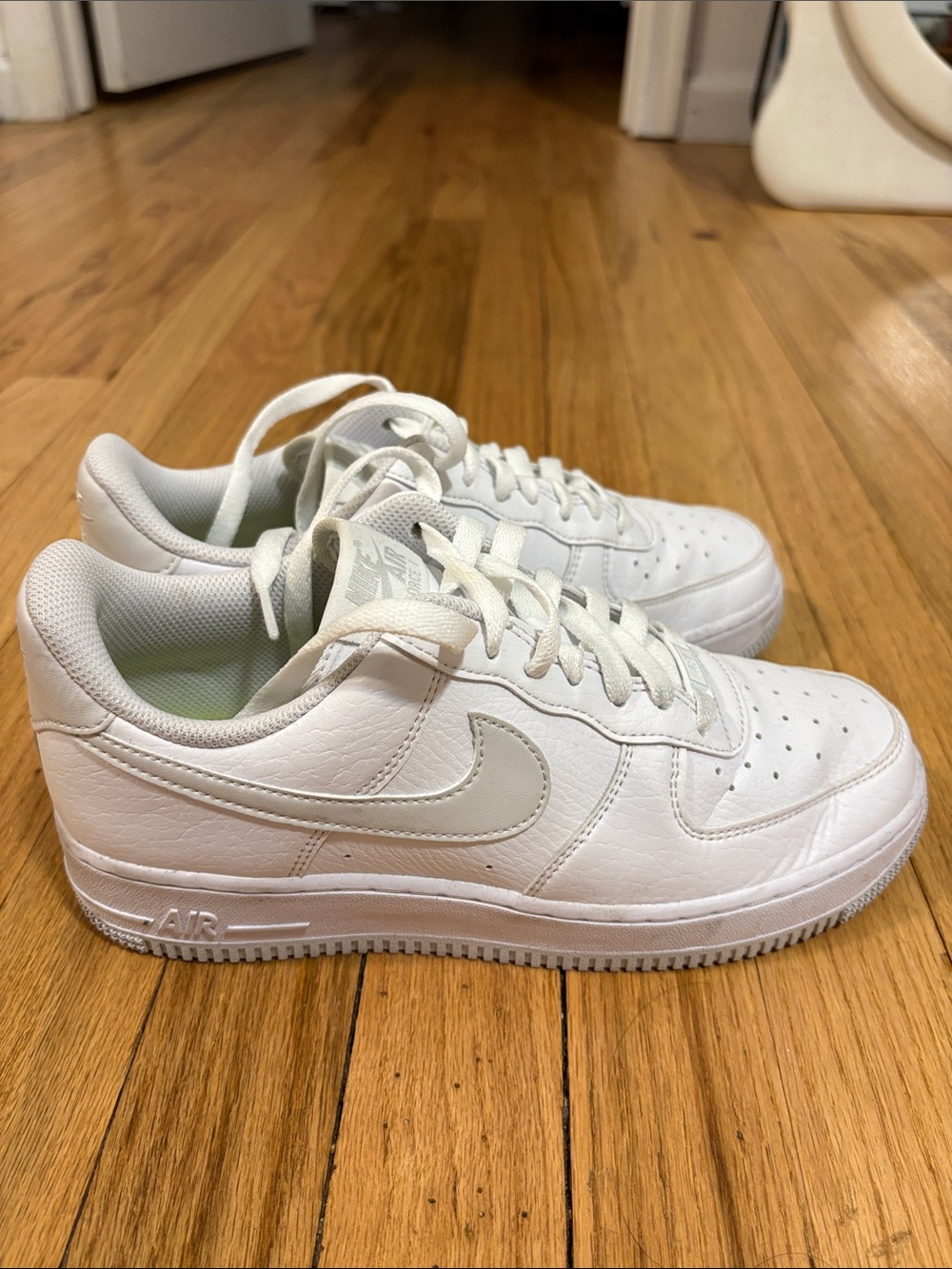 Nike White Low-Top Sneakers with Light Gray Swoosh